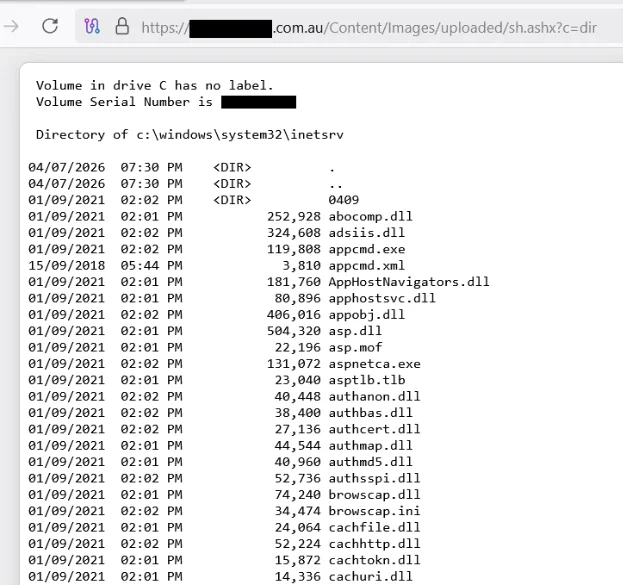 A directory listing returned by a web shell on the site, with identifying details redacted.